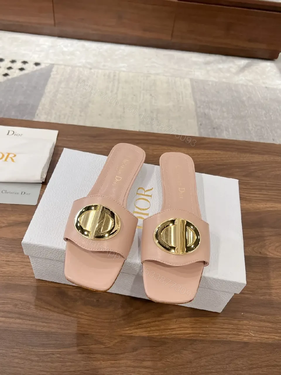 View 2 of Blush Pink Leather Modern Gold Logo Dior Slides