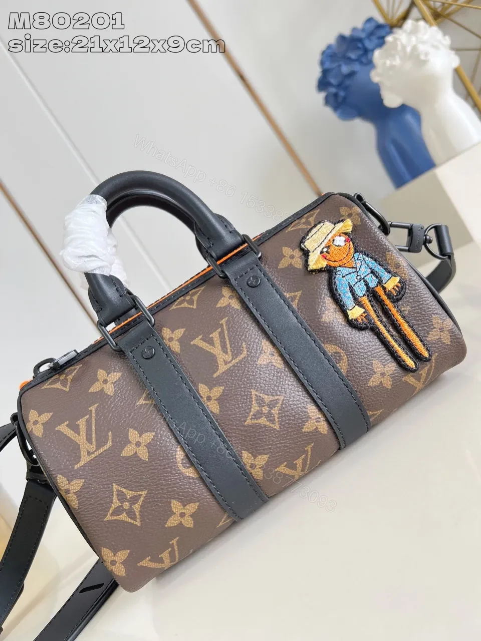 View 2 of Brown Monogram Handbag with Playful Patch – Luxe Everyday Carrier