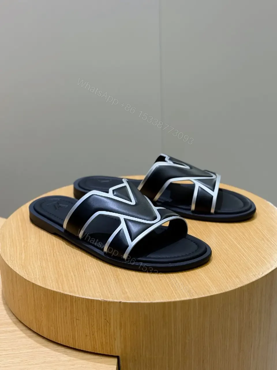 View 5 of Statement V Sandals: Luxury Comfort & Signature Motif Footwear