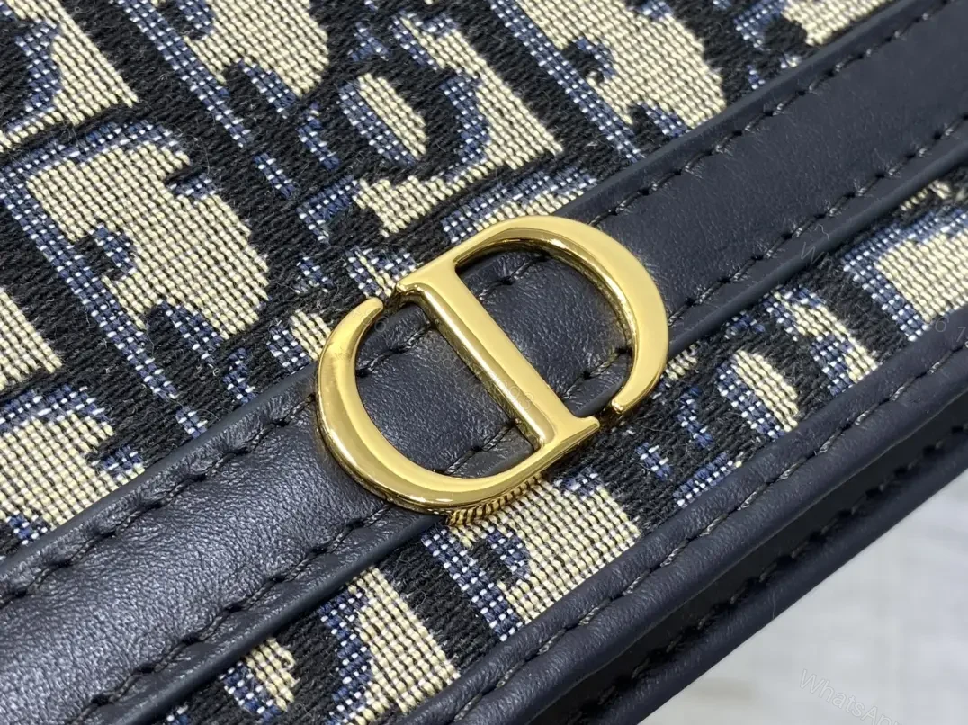 View 8 of Navy monogram canvas leather-trim shoulder bag for everyday luxury