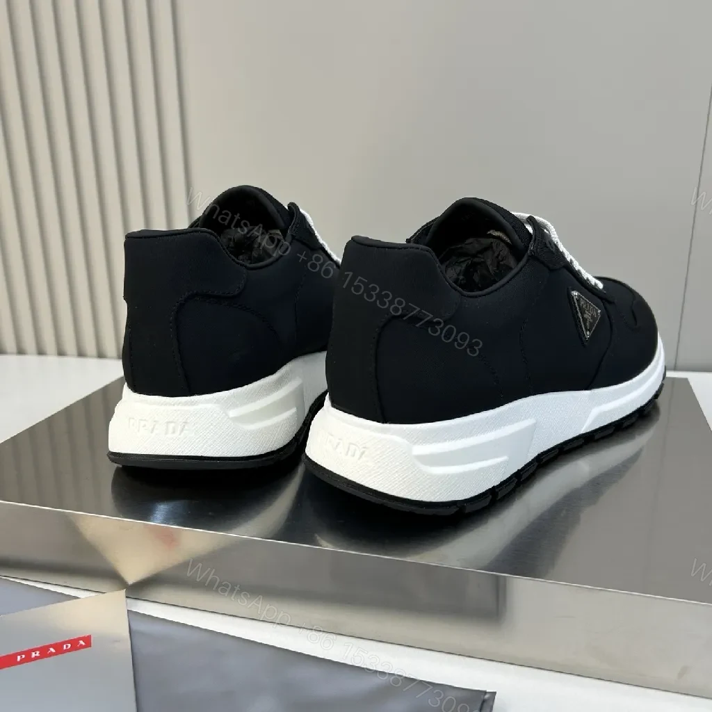 View 2 of Monochrome Luxe Performance Sneakers: Subtle Comfort