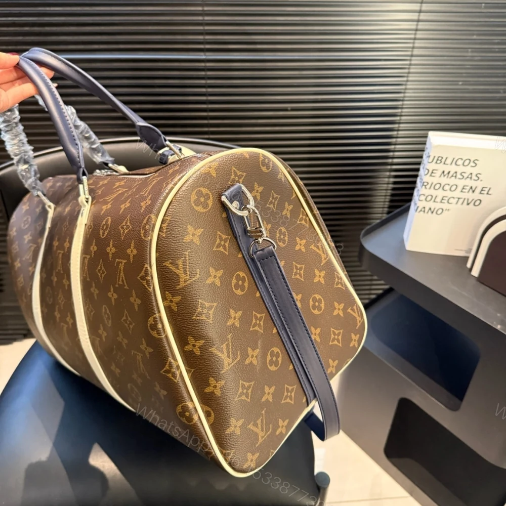 View 3 of Louis Vuitton Keepall Bandoulière 50 Monogram Canvas Light Yellow 45cm