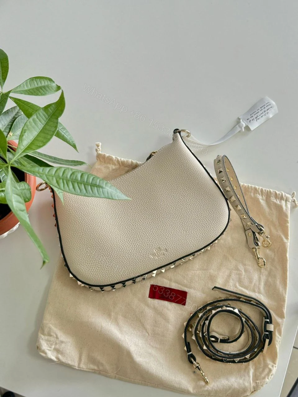 Valentino Garavani Small hobo bag made of leather “Rockstud — view 1