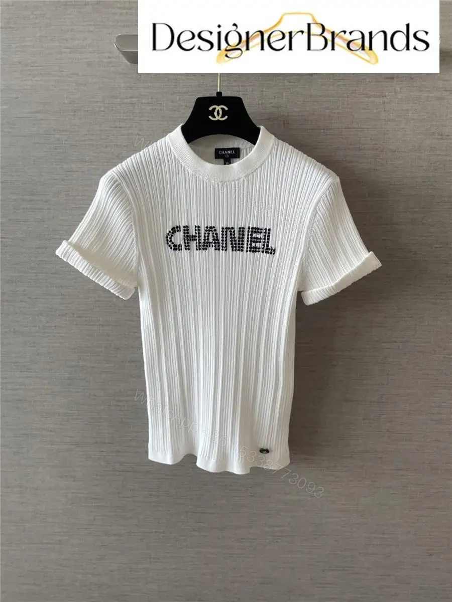 View 6 of White Knit Tee with Logo Embellishment – Elevated Texture, Modern Luxury