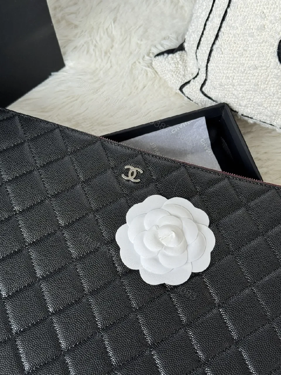View 7 of Compact Black Quilted Leather Clutch with Silver Logo