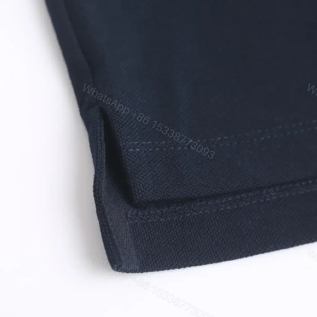 View 3 of Navy Pique Polo: Classic Knit, Luxe Texture, Everyday Style