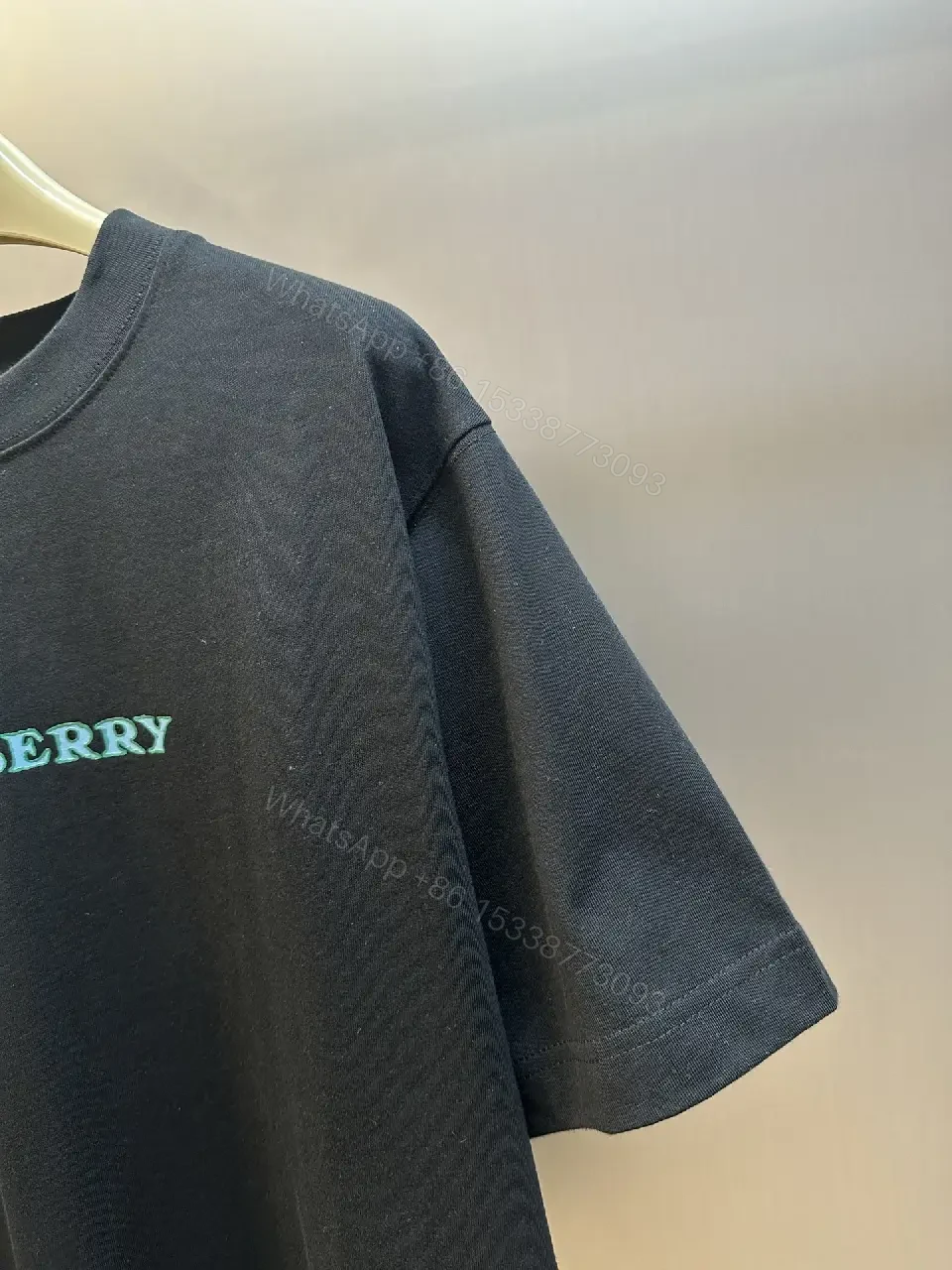 View 9 of Black Knit Oversized Tee Turquoise Burberry Text T-Shirt