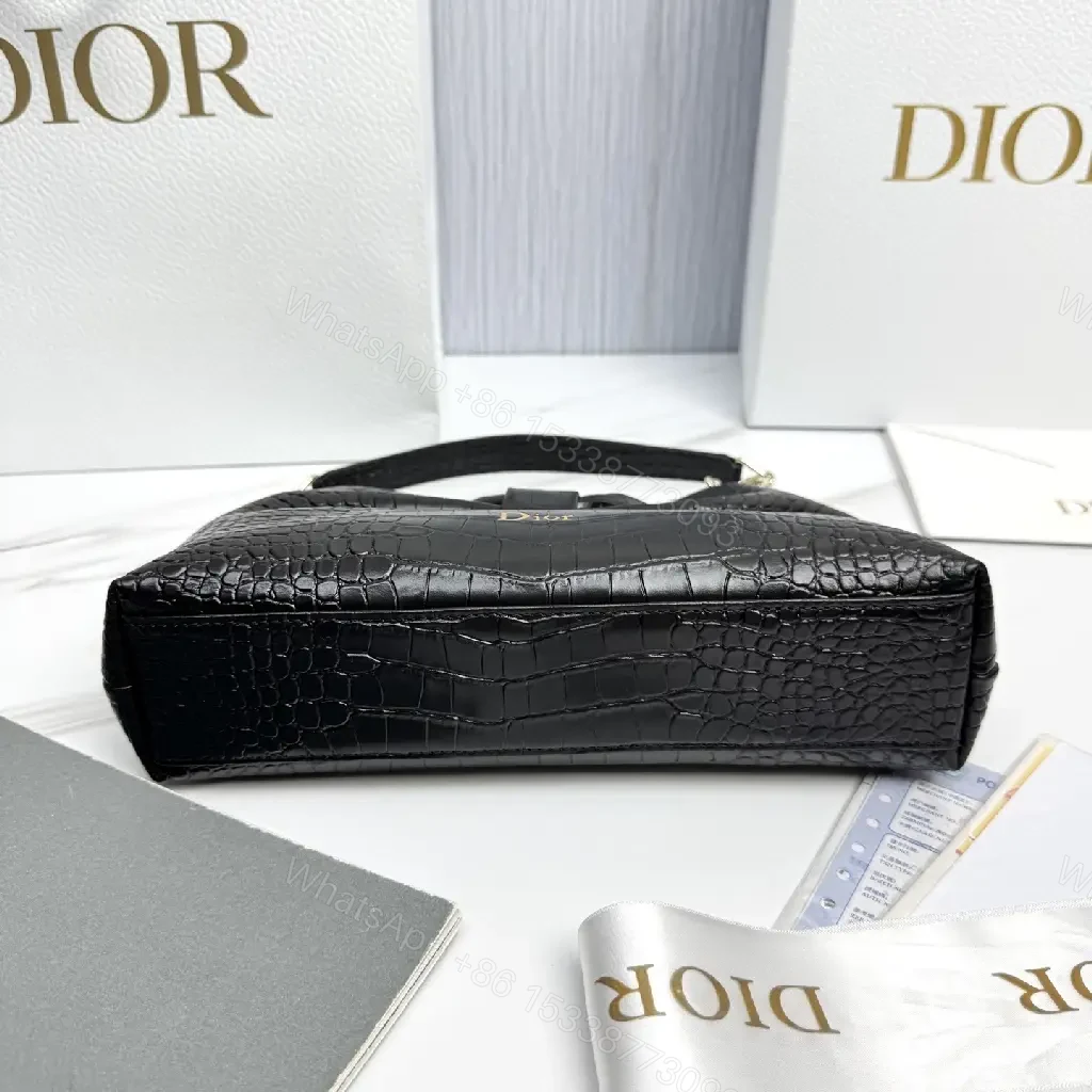 View 4 of Croc-Texture Bow Clutch: Leather Luxury, All-Day Glam