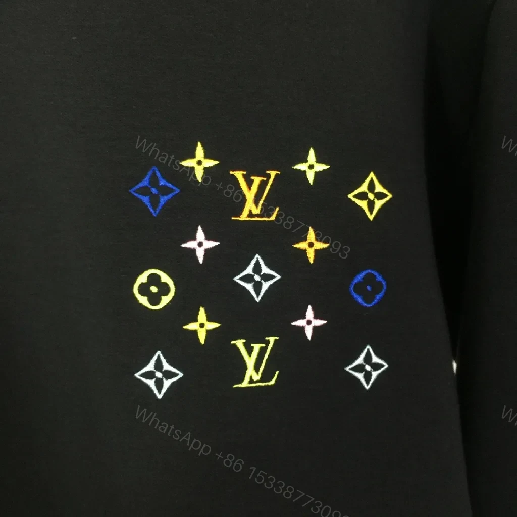 View 2 of Black Crewneck Knit with Multicolor Logo Motif, Everyday Luxe
