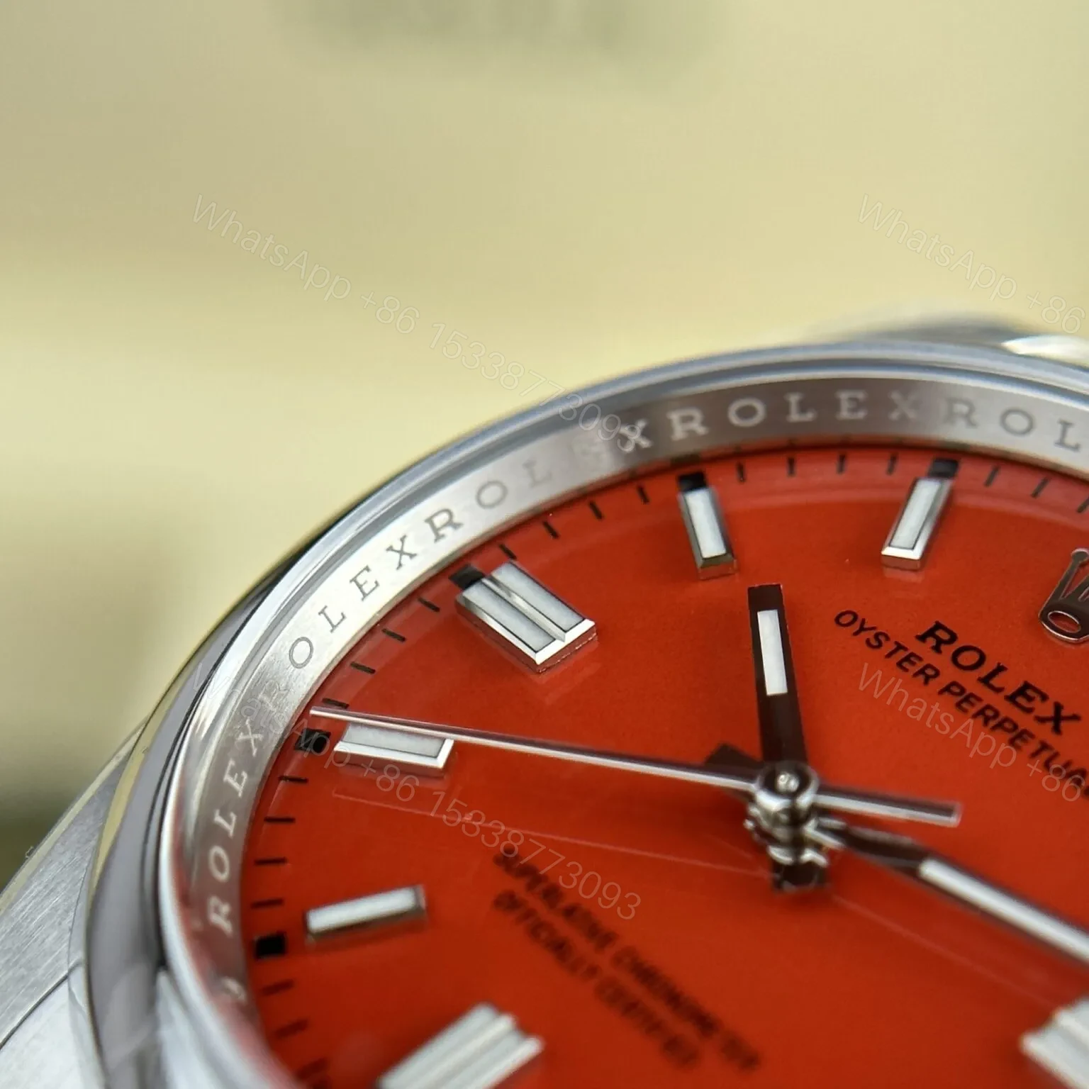View 5 of Replica Rolex Oyster Perpetual Coral Red Dial 124300 41 mm