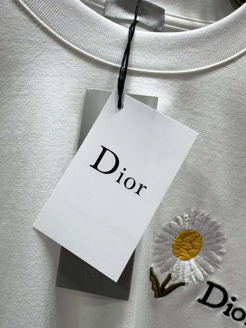View 4 of Soft-White Cotton Tee with Embroidered Daisy Accent, Relaxed Fit