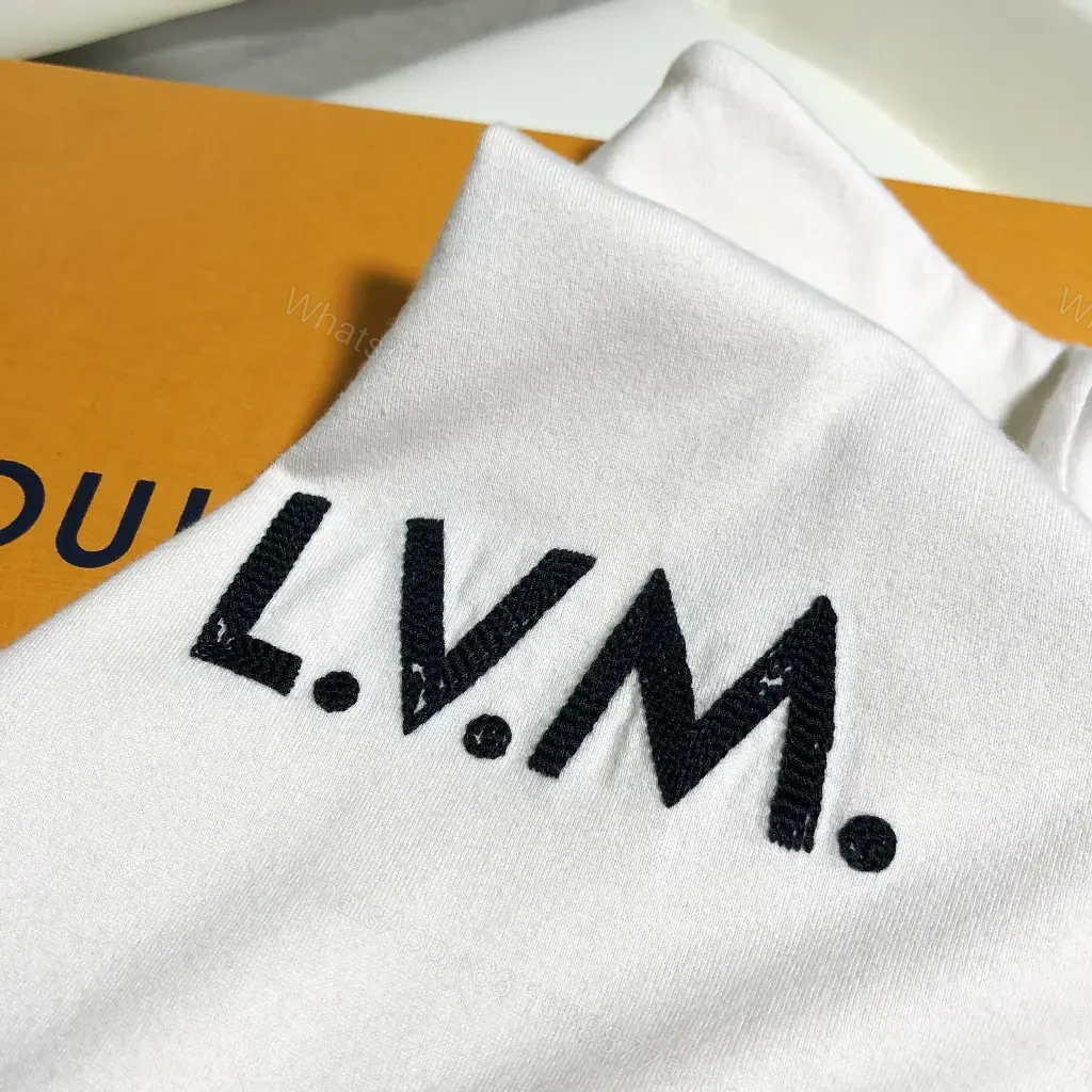 View 2 of White Cotton Minimal T-Shirt with LV.M Logo