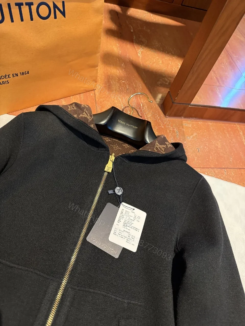 View 10 of Black Zip Hoodie: Monogram Detail, Premium Cotton Blend, Versatile Luxury