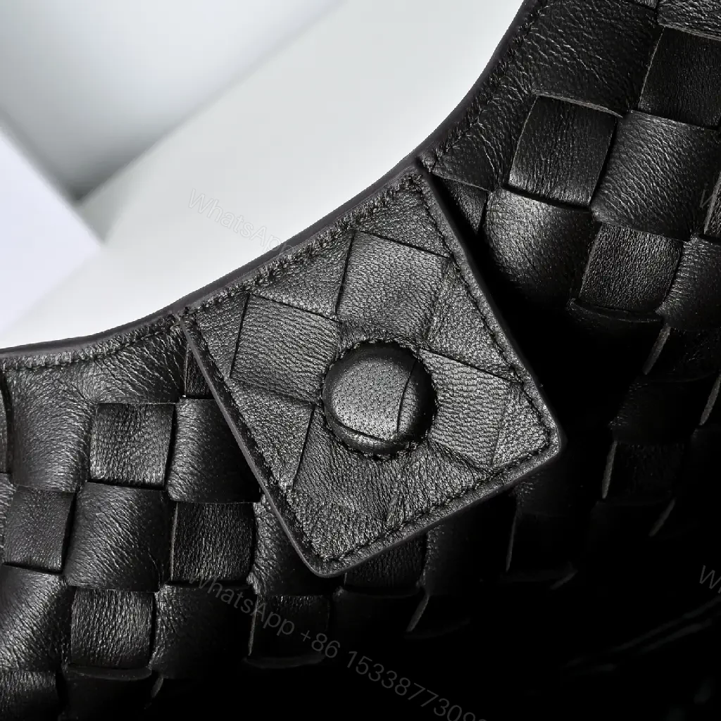 View 7 of brown woven leather hobo bag with intrecciato texture for everyday luxury