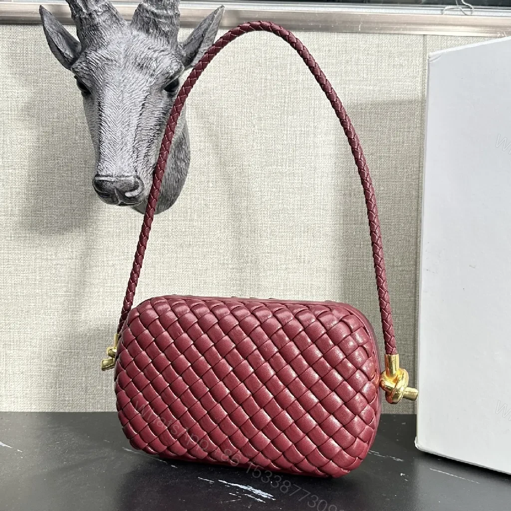 View 2 of Richly Textured Burgundy Crossbody Bag – Woven Leather, Compact Style