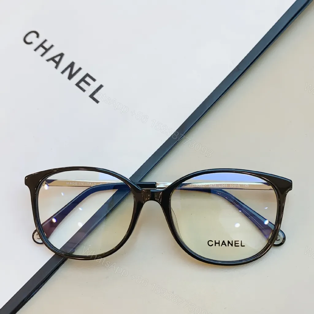 View 2 of Patterned Frame, Visible Hardware, Classic Tort: Sophisticated Eyewear