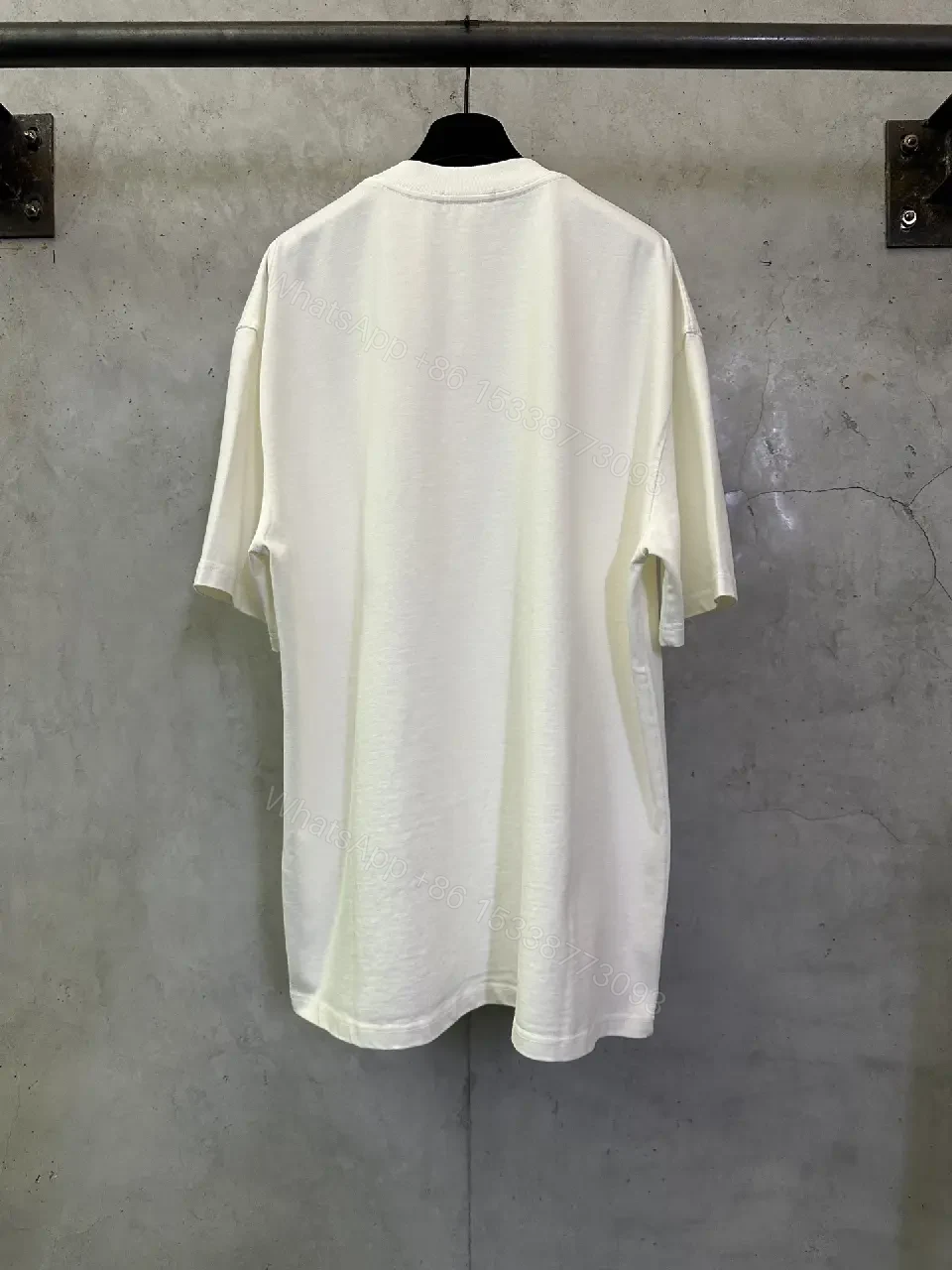 View 9 of Oversized White Cotton Tee with Bold CELINE Arch Graphic