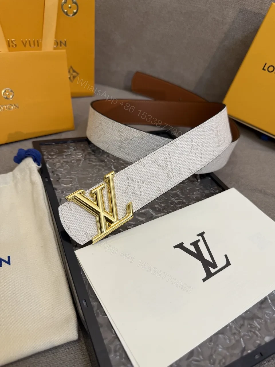 View 2 of Textured Leather Belt with Gold Buckle – Subtle Luxury Accessory