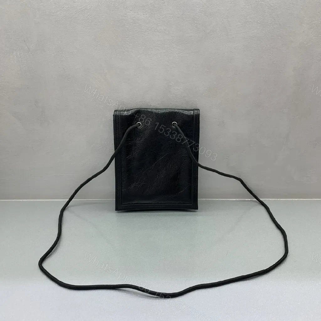View 5 of Compact Black Leather Crossbody: Modern Texture, Ultra-Functional