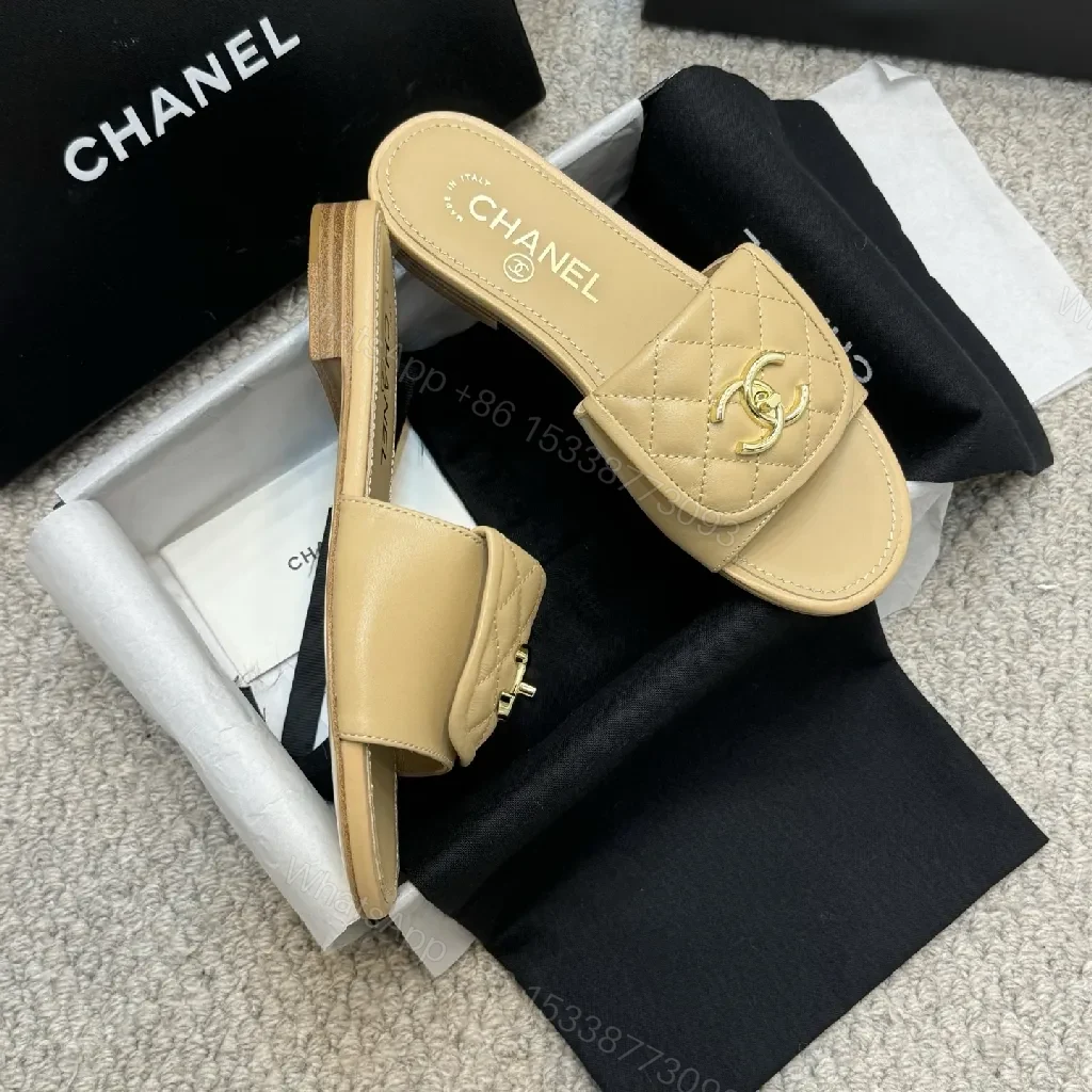 View 7 of Beige Quilted Leather Sliders with Gold Logo—Elegant Comfort