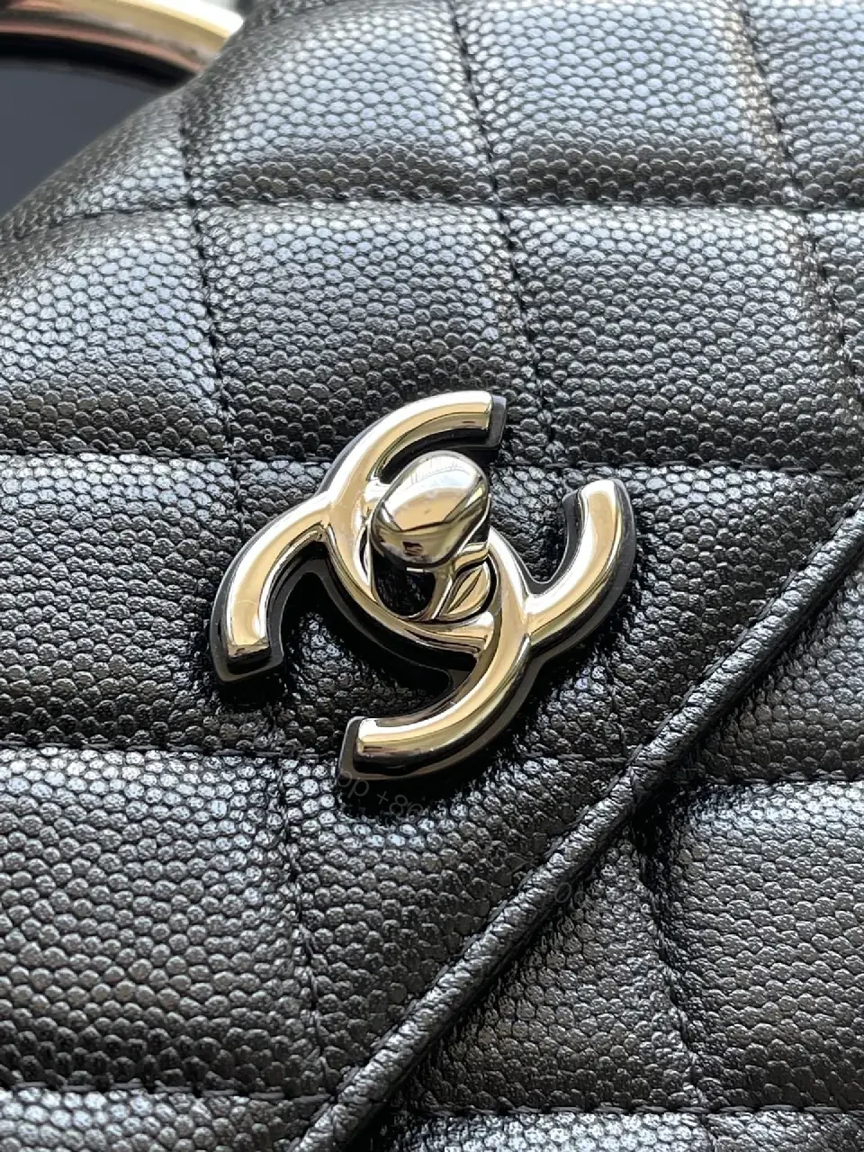 View 4 of Black Quilted Leather Mini Bag - Chain Handle, Compact Luxury