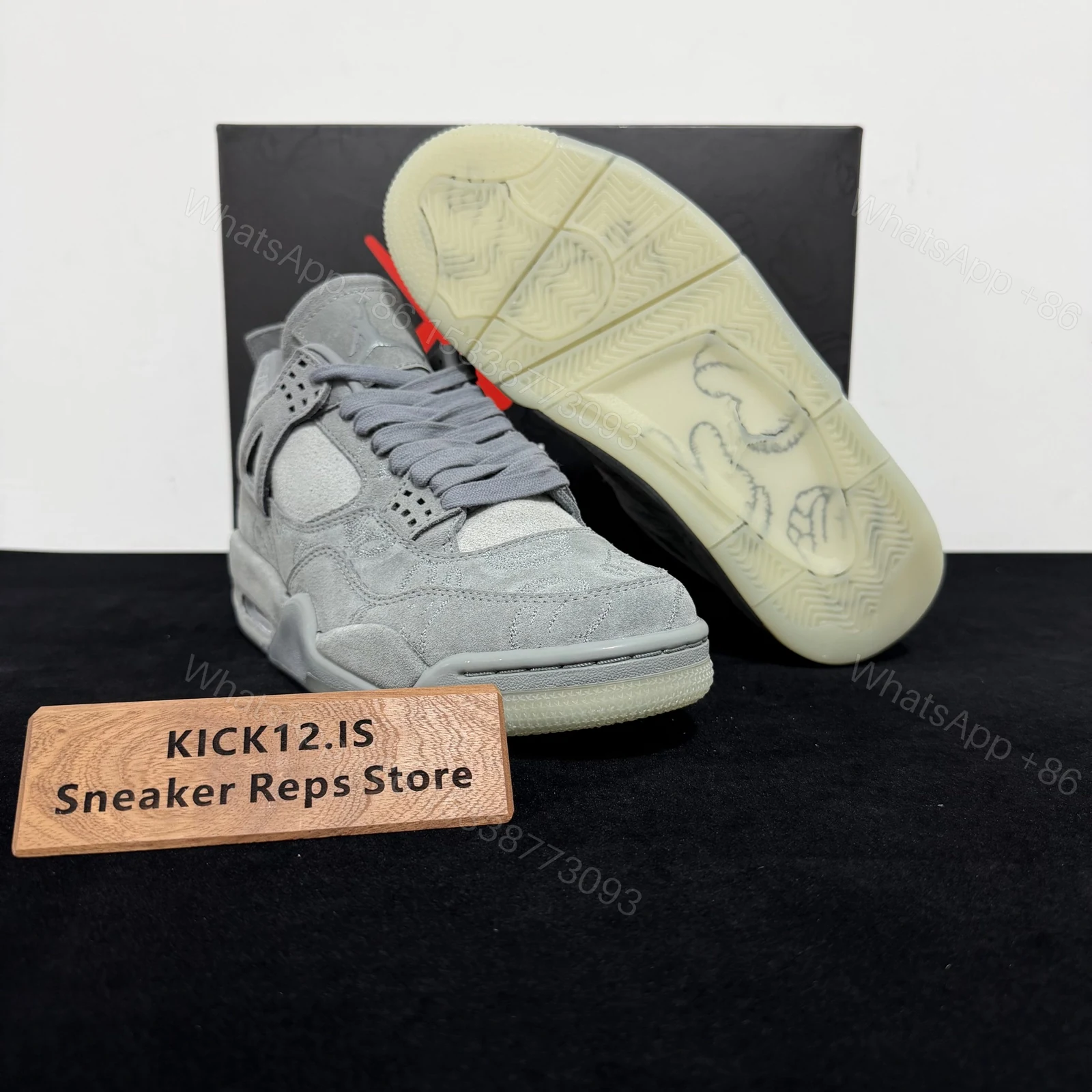 View 3 of Air Jordan 4 Retro KAWS Grey Reps