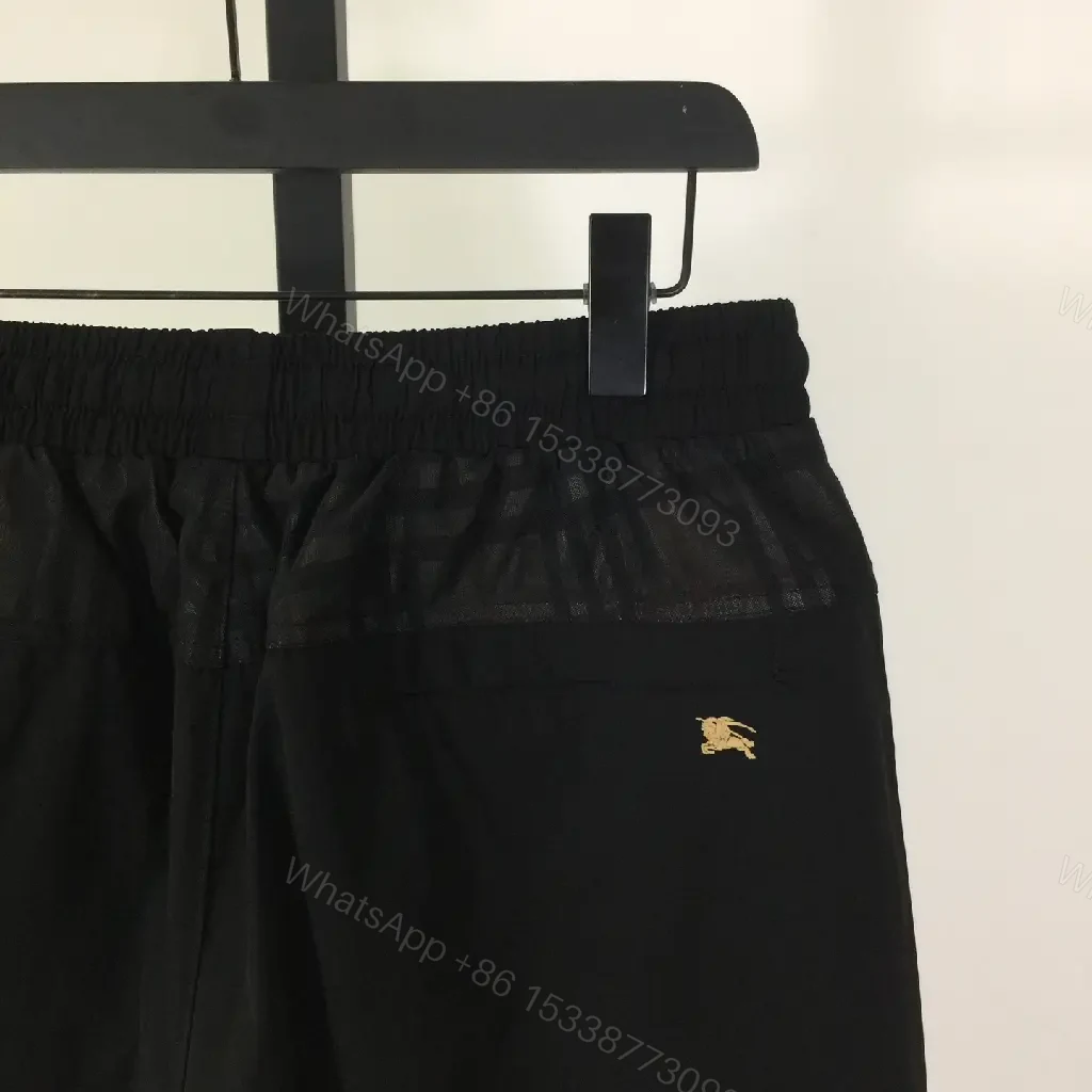 View 2 of Black Nylon Shorts with Burberry Stripes Drawcord Opening