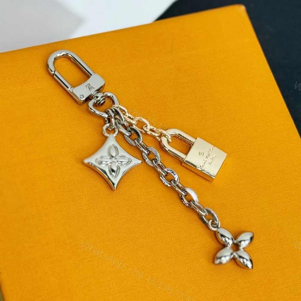 View 10 of Louis Vuitton Lv Logo Bag Charms Key Holder