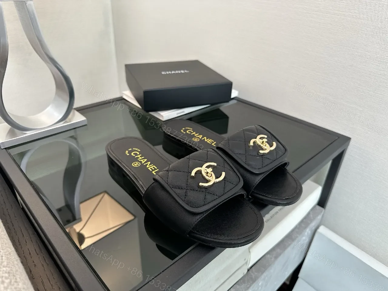 Quilted Black Slide with Gold Logo – Casual Luxe Footwear — view 1