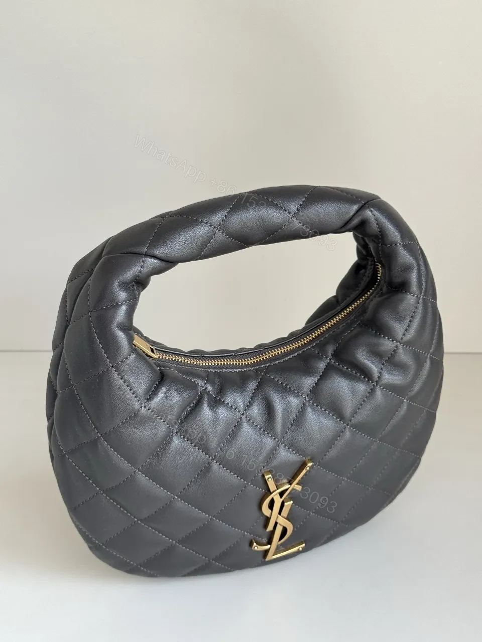 View 9 of Quilted Mini Bag with Gold Logo – Elegant Everyday Carry