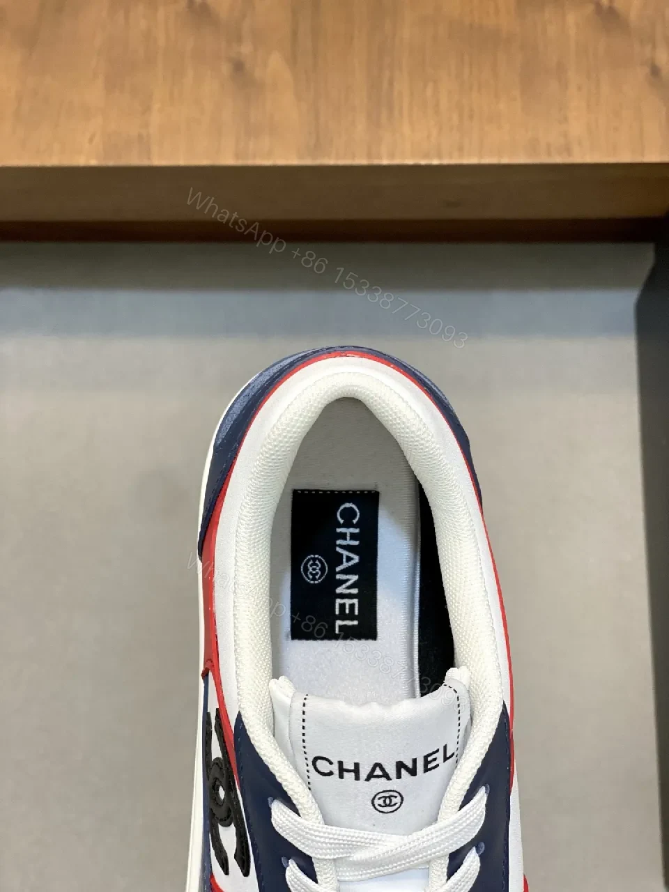 View 3 of Bold Color-Blocked Leather Sneakers with Logo Detail