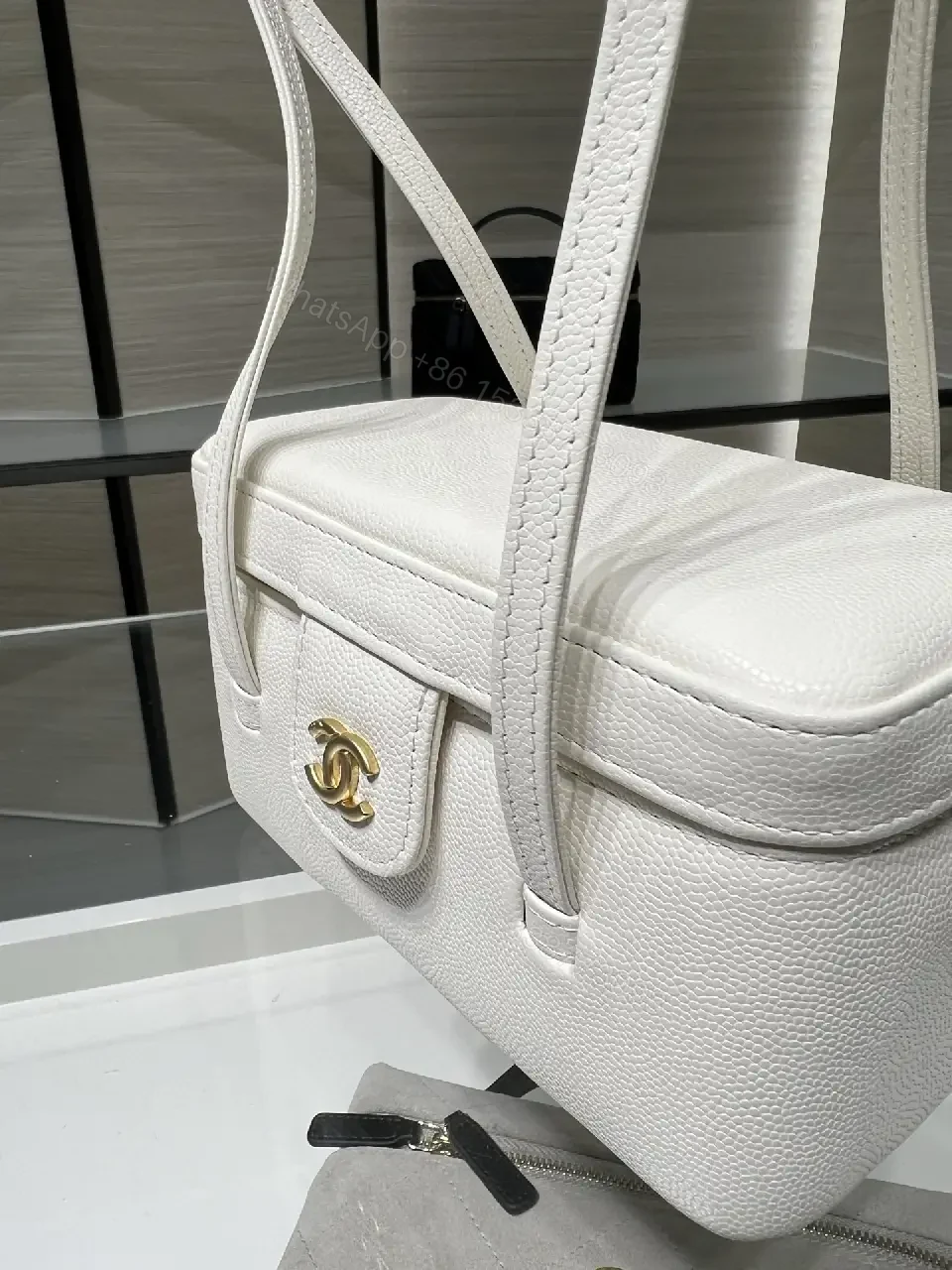 View 8 of Chic Pebbled Leather Compact Handbag - Structured, Versatile, Everyday Elegance