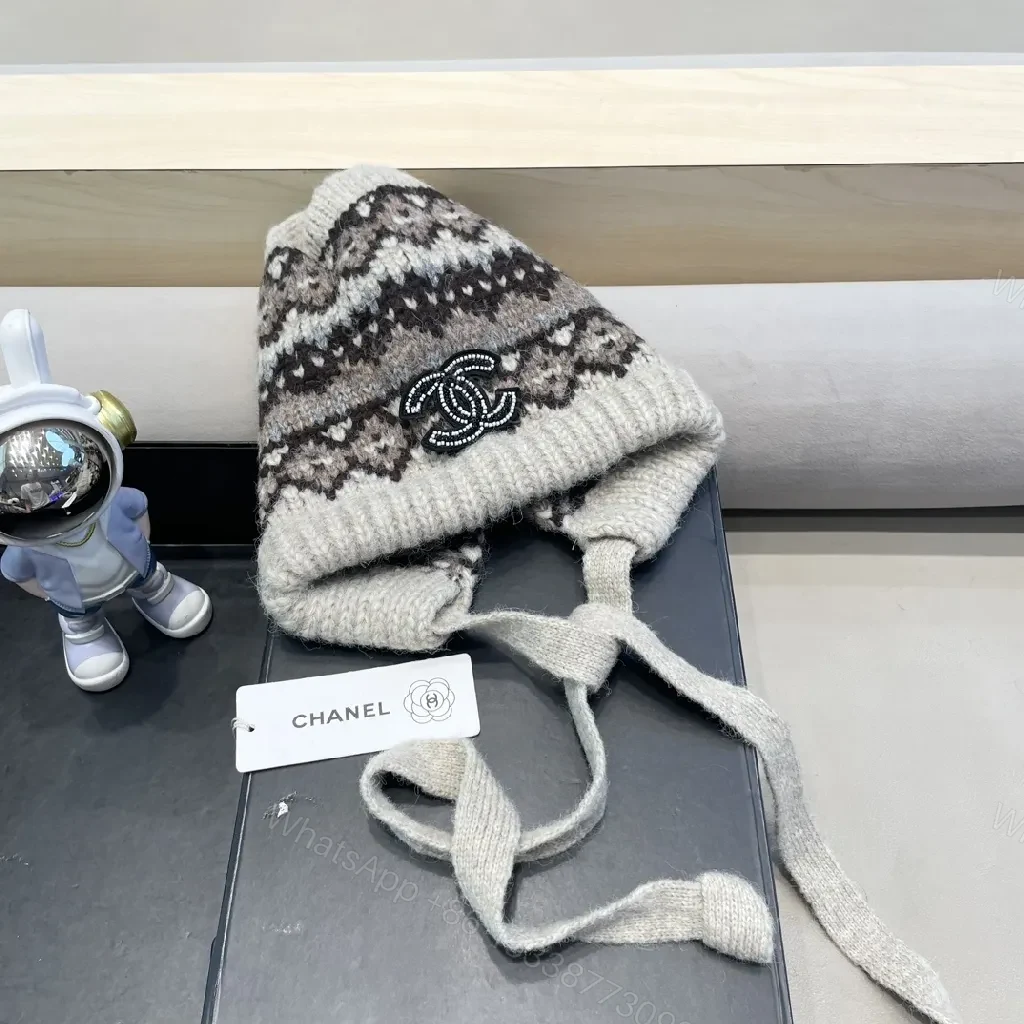 View 4 of Marled Knit Hat with Logo & Ear Flap Detail – Cozy Luxe