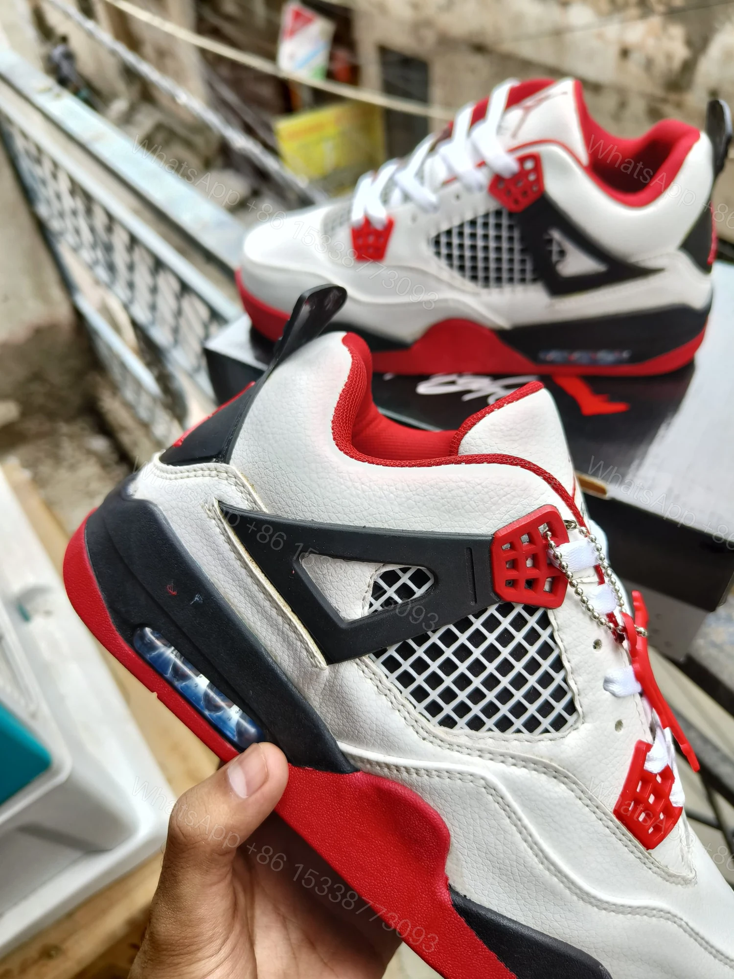View 8 of BUY FIRST COPY NIKE JORDAN 4 “RED/WHITE” SNEAKERS