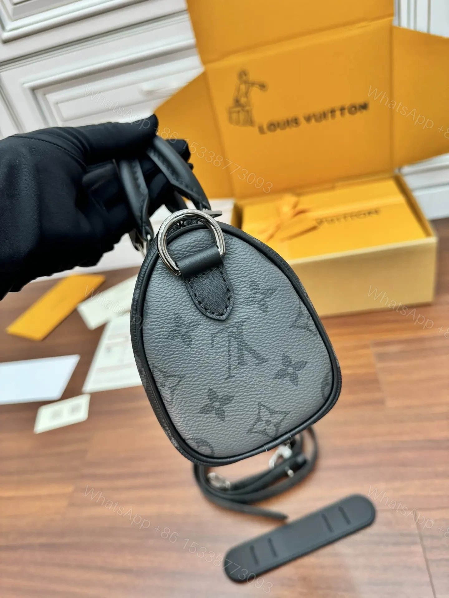 View 4 of Louis Vuitton Keepall Bandoulière 25 Bag in Monogram Eclipse
