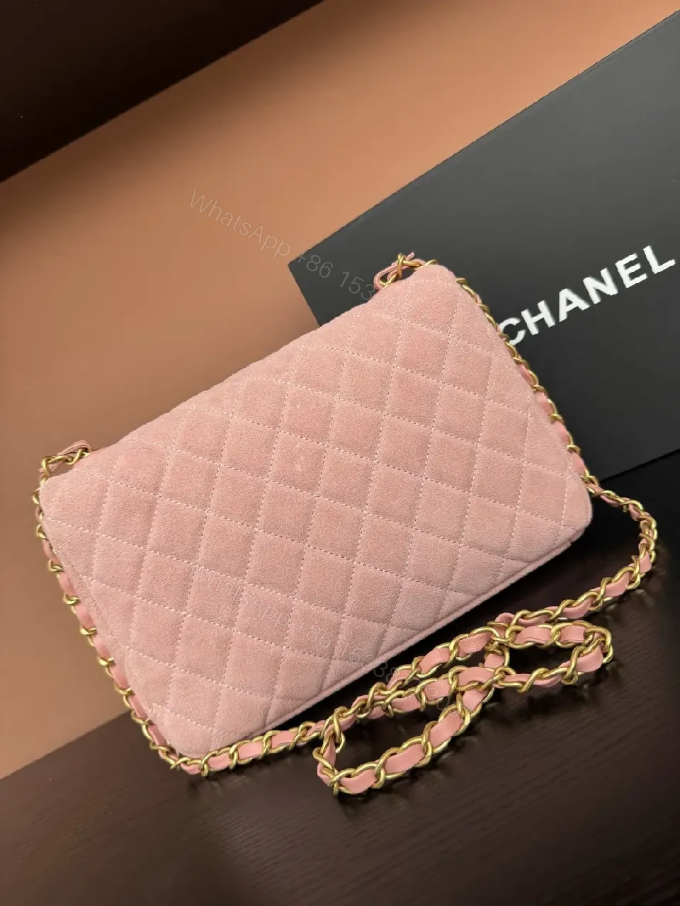 View 3 of Soft Pink Quilted Shoulder Bag with Gold Lock - Compact Luxury Bag