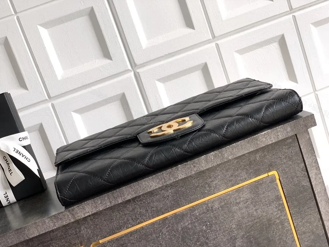View 3 of Compact Quilted Leather Wallet with Gold Logo