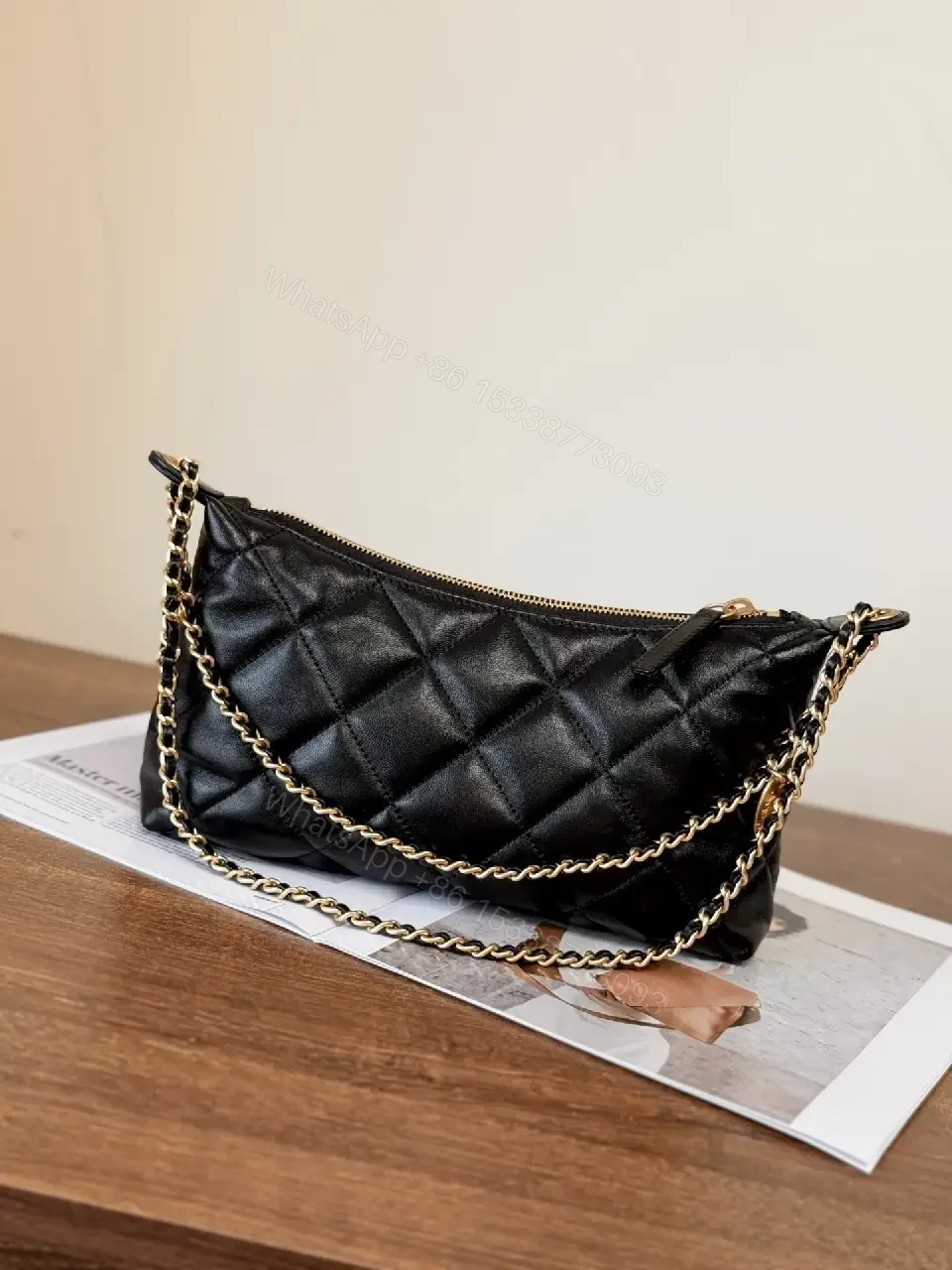 View 5 of Quilted Crossbody with Gold Emblem: Compact Luxury Bag