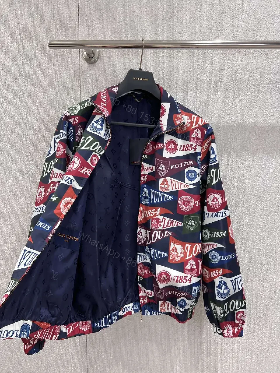 View 2 of Bold Patterned Zip Jacket: Logo Motif Luxury Streetwear