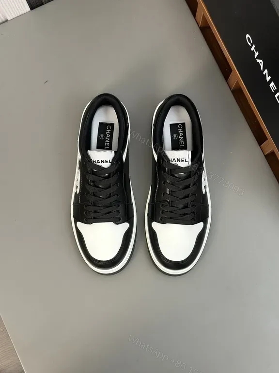 View 2 of Monochrome Chanel-Style Low-Top Sneakers with Signature Emblem