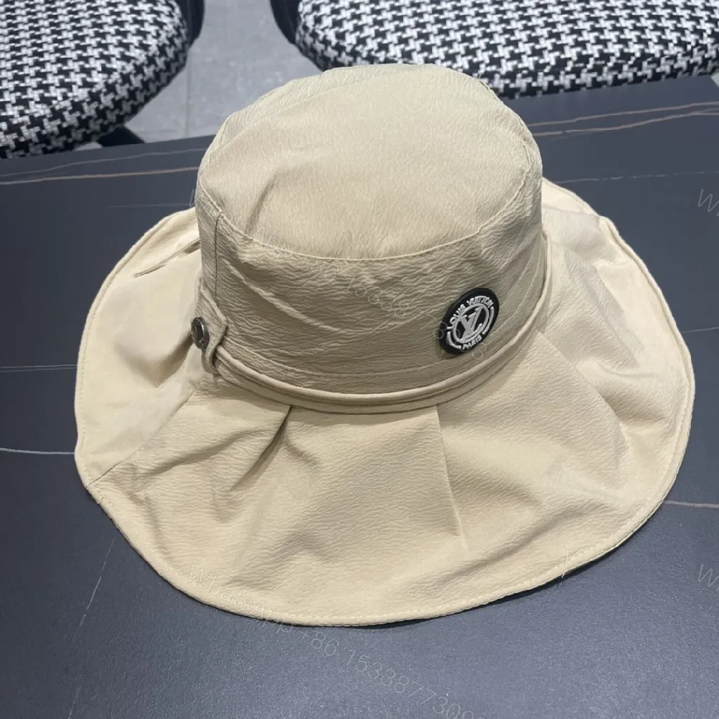 View 2 of Beige Textured Bucket Hat with Emblem, Everyday Luxury