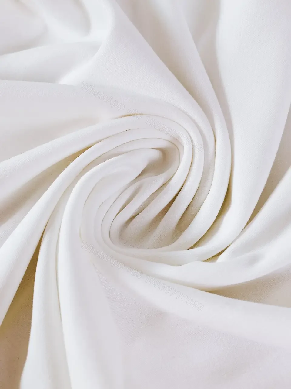 View 9 of Minimalist White Cotton Tee with Subtle Luxury Detail