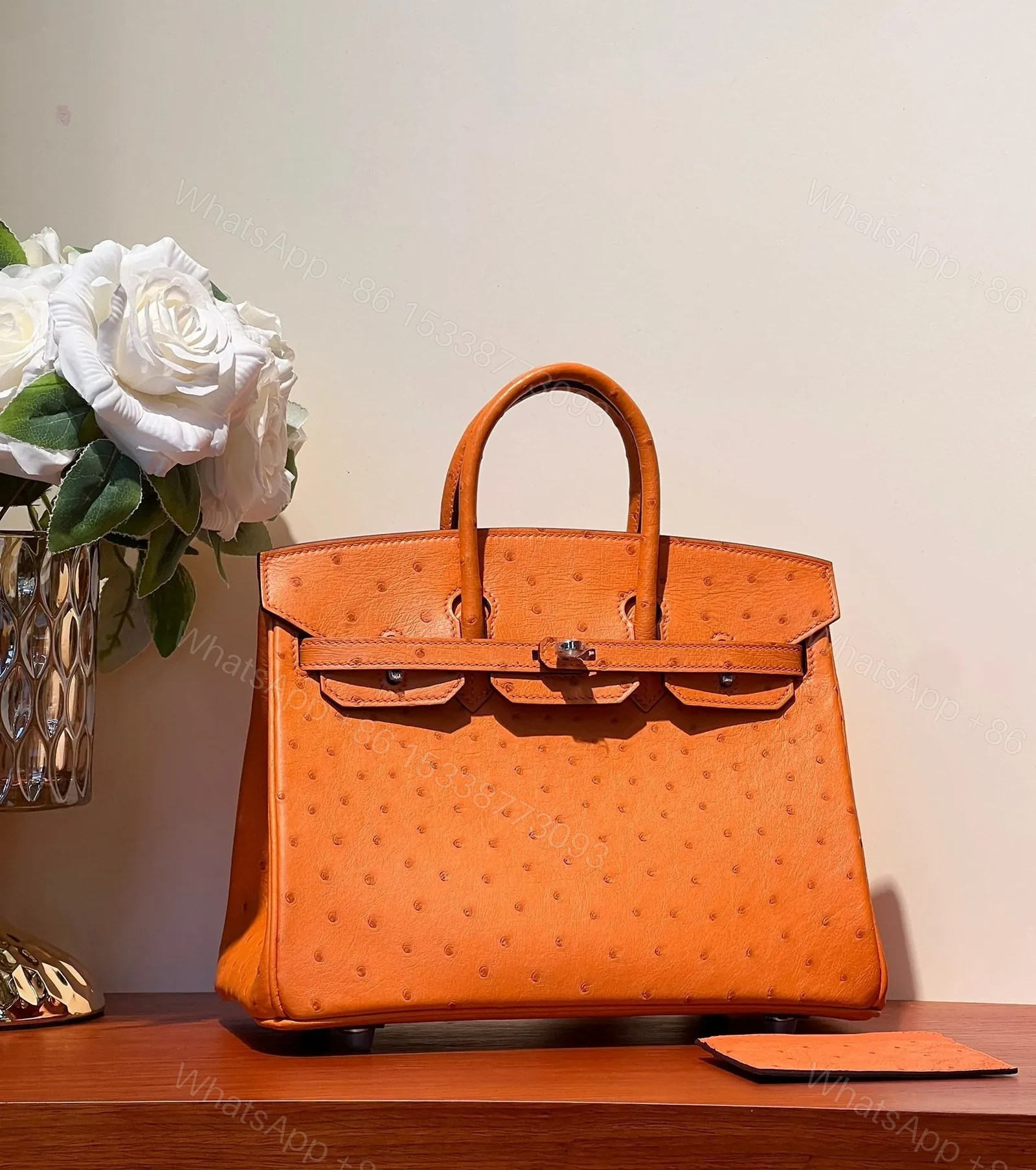 View 3 of HN 25 BAG IN FIRE ORANGE OSTRICH LEATHER WITH SILVER HARDWARE
