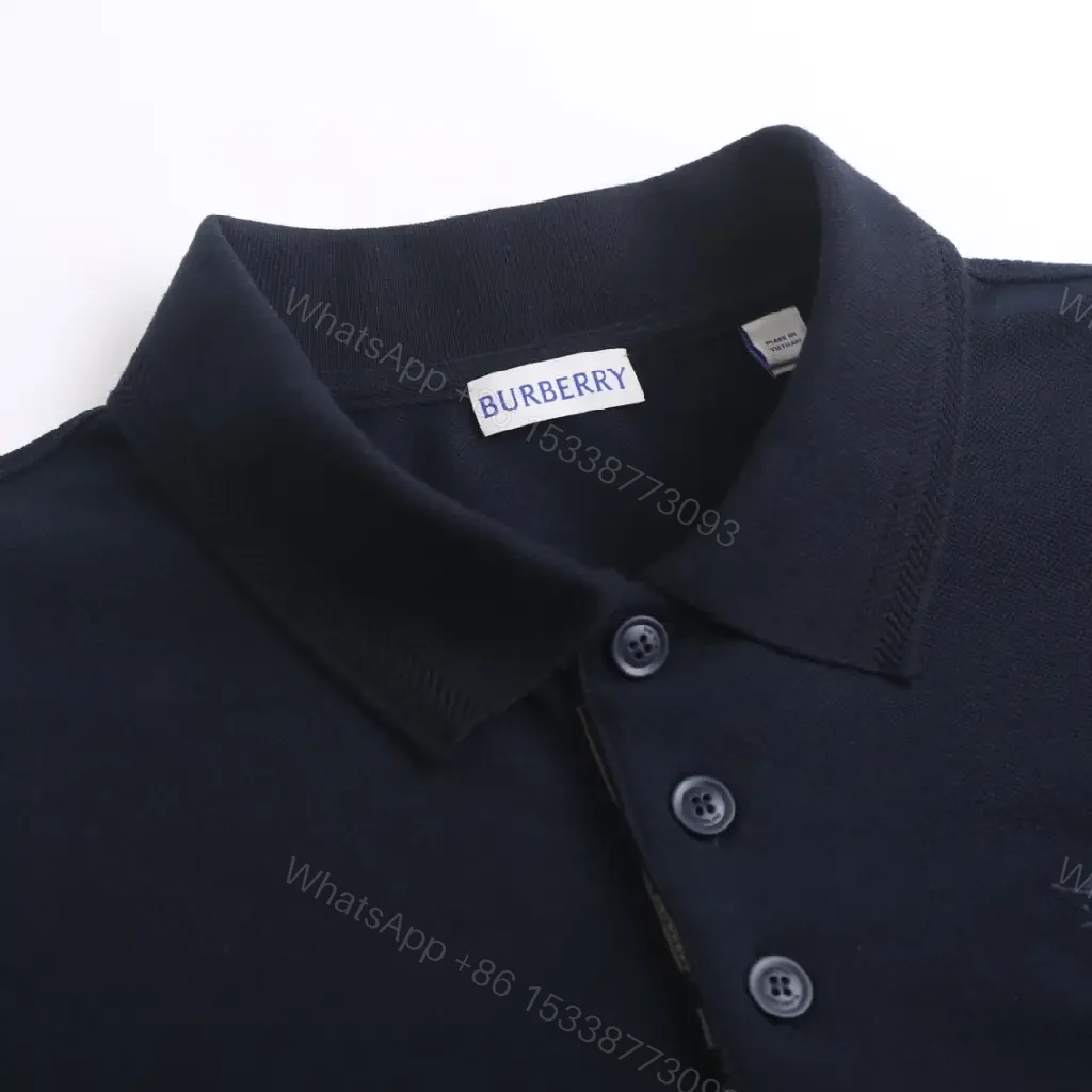 View 9 of Navy Pique Polo: Classic Knit, Luxe Texture, Everyday Style
