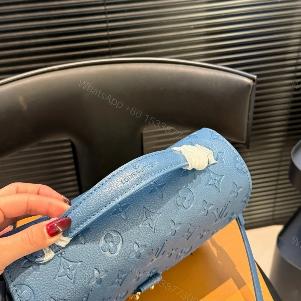 View 4 of Louis Vuitton Pochette Métis Monogram Empreinte Bleu Jean 25cm M27357