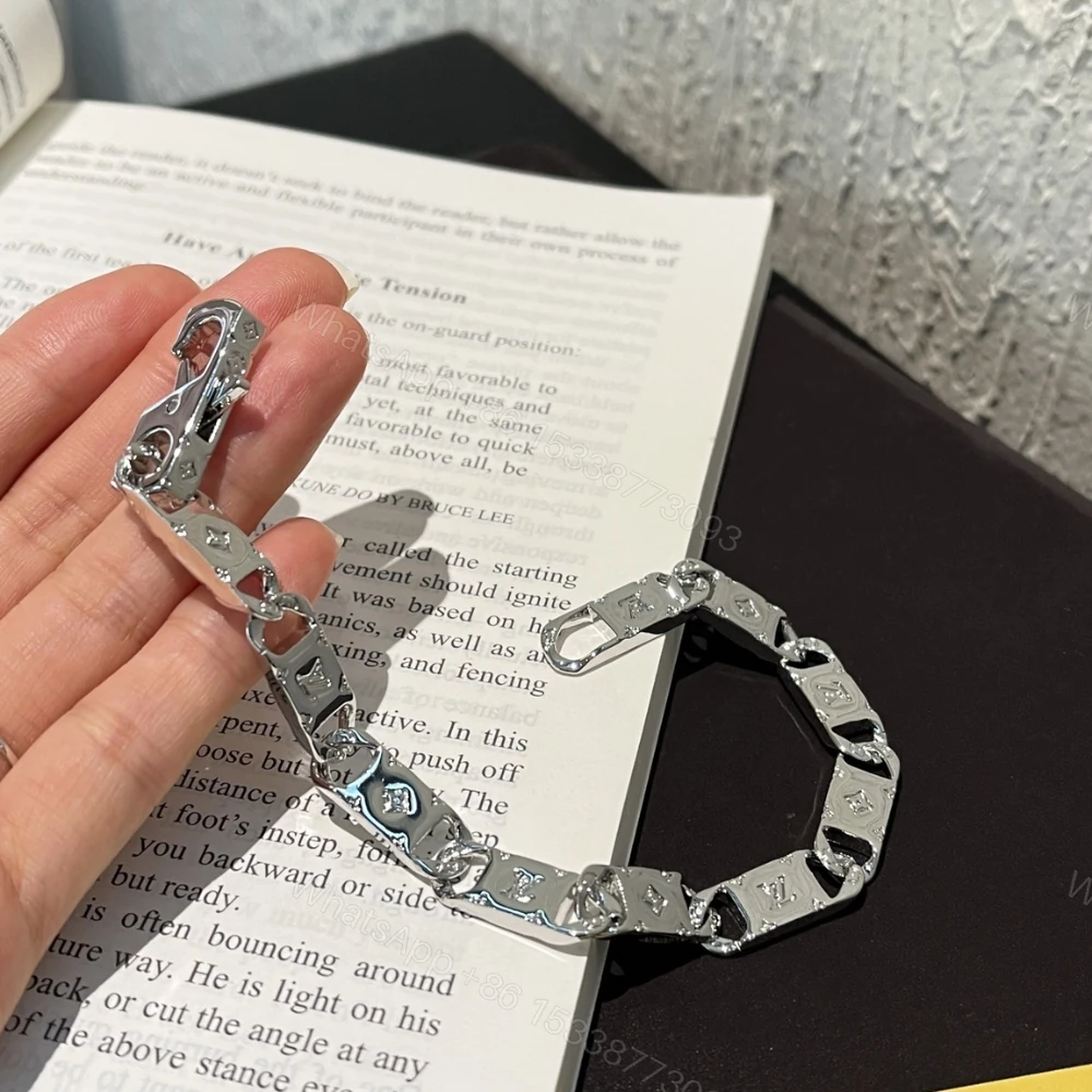 View 5 of Louis Vuitton Monogram Tied Up Bracelet Silver M0921M