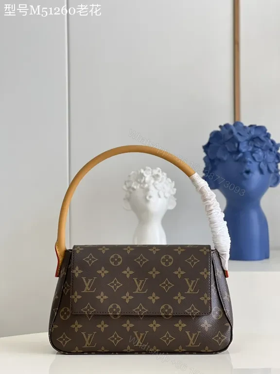 Louis Vuitton Monogram Top-Handle Bag: Compact Luxury for Day to Night — view 1