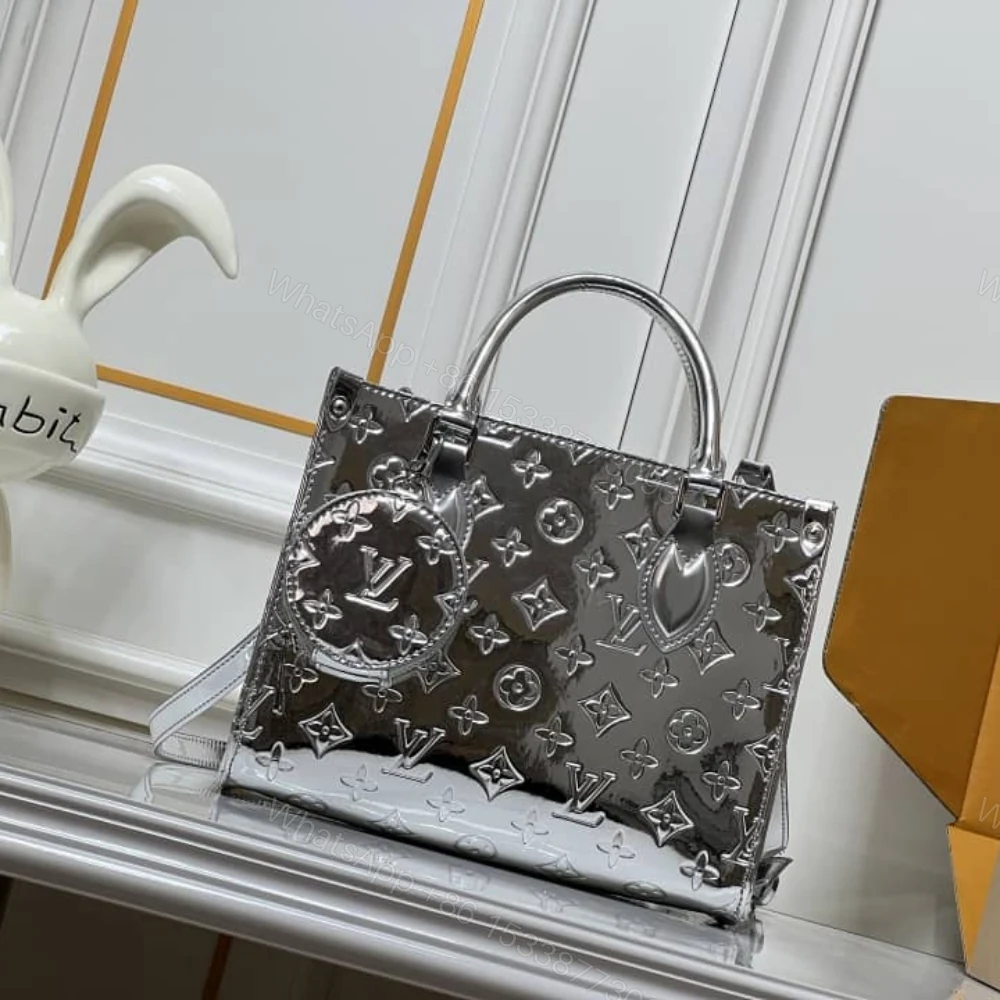View 2 of Louis Vuitton Onthego PM Silver 25Cm M26373