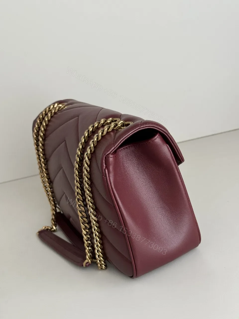 View 2 of Burgundy Quilted Leather Shoulder Bag with Gold Hardware