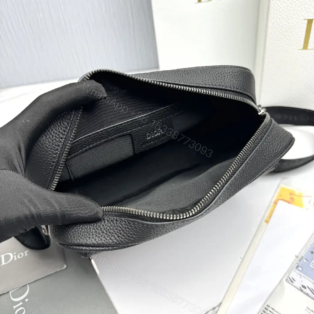 View 4 of Compact Leather Crossbody Bag - Embossed Texture, Luxury Minimalism